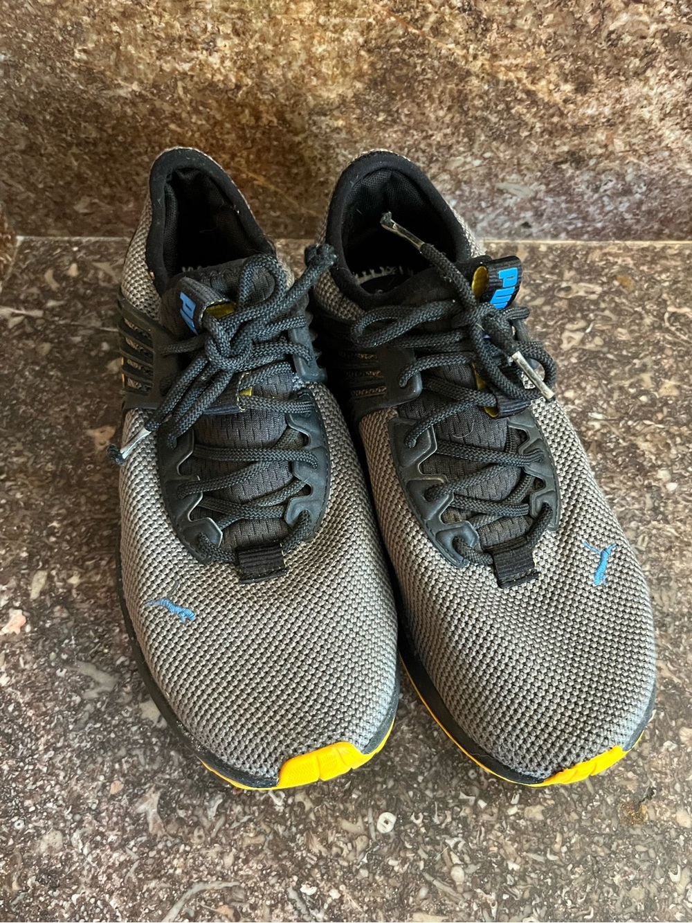 Puma Men's Grey Athletic Shoes with Yellow and Blue Accents